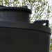 Side view of the black MDPE lifteye lifting point on a 10,000 litre, tall, above-ground rainwater harvesting tank by Ecosure.
