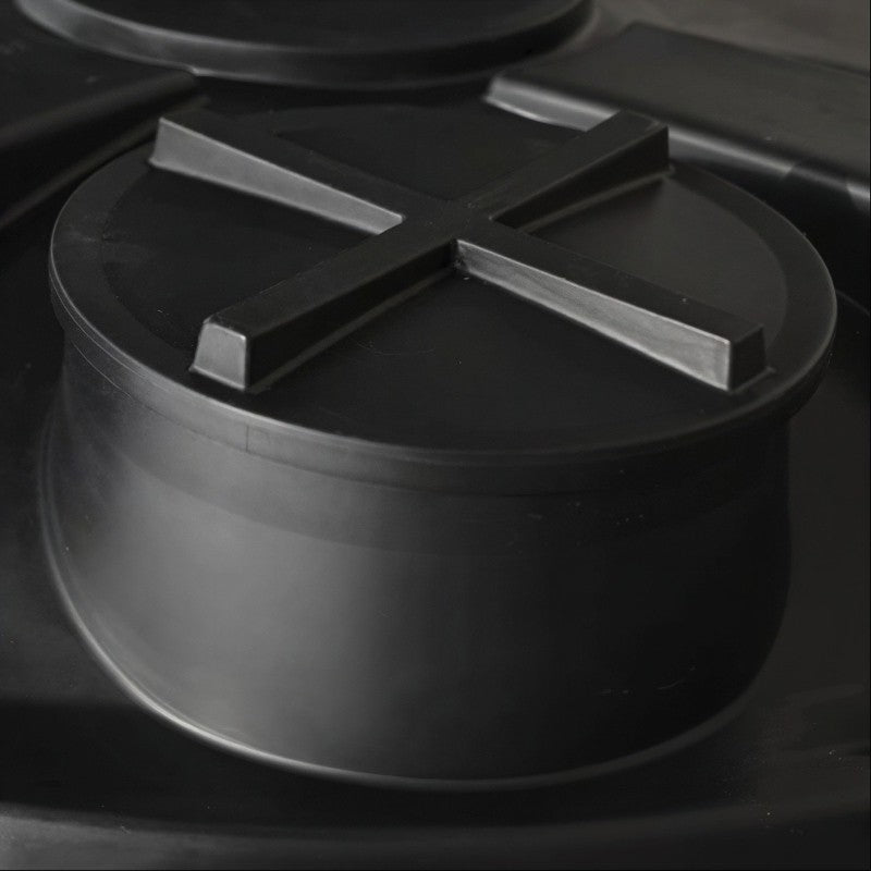 Top view of the black MDPE tank lid on a tall 10,000 litre, large, above-ground rainwater harvesting tank by Ecosure.