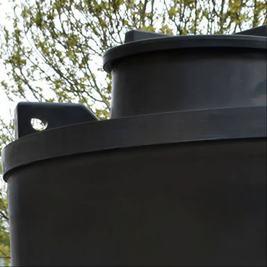 Side view of the black MDPE lifteye lifting point on a 13,000 litre, tall, above-ground rainwater harvesting tank by Ecosure.